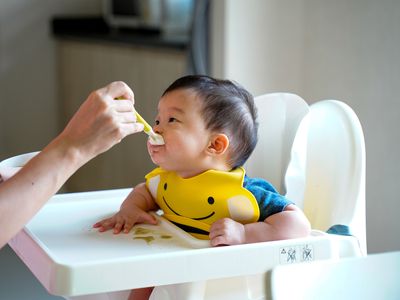 baby eating solid foods