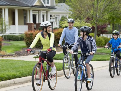 Family riding bicycles together