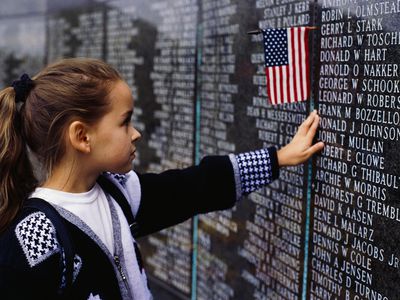 Young girl visiting Vietnam Veterans Memorial