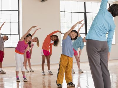 kids stretching in gym class