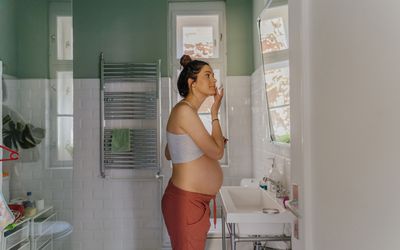 Pregnant Woman Doing Skincare