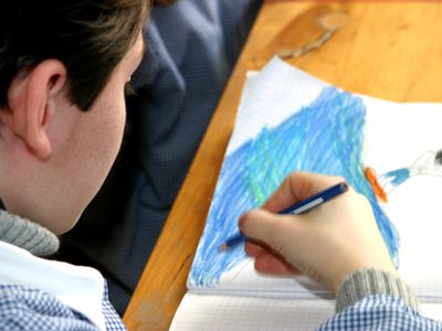 tween drawing picture with colored pencils