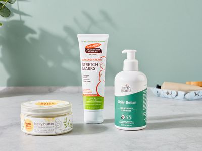 Several stretch mark creams we recommend displayed on a gray counter
