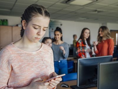 Girl being bullied by text message