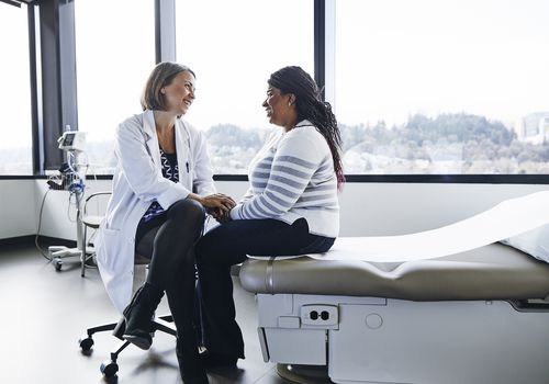 Doctor talking to patient