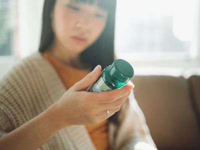 Woman with vitamins