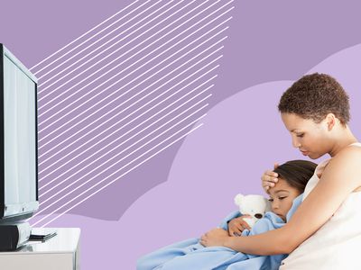 Parent holds sick child while watching TV