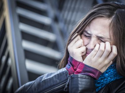 teen girl very distressed