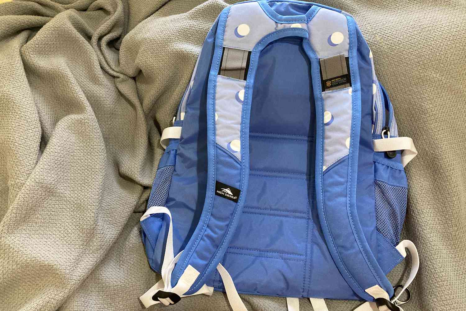 High Sierra Loop Daypack Backpack placed on blanket