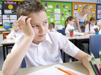 A sad child at school
