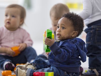 Toddlers playing with blocks