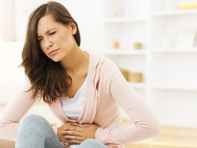 Woman with a stomach ache