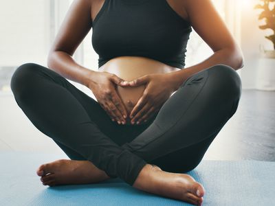 pregnant woman doing yoga