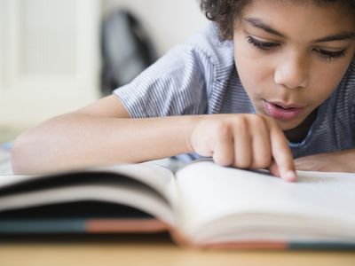 Child reading a book