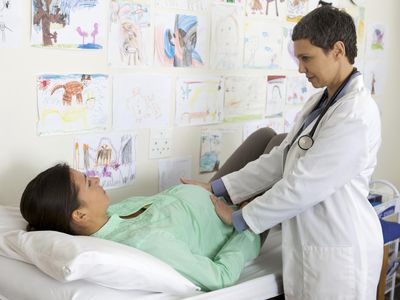 Pregnant woman getting an exam