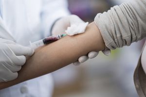 woman having blood drawn