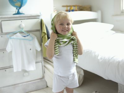 boy getting dressed