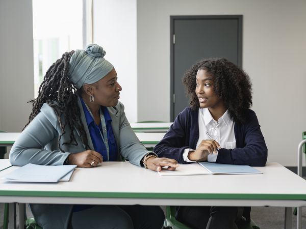 Tutor working with a student