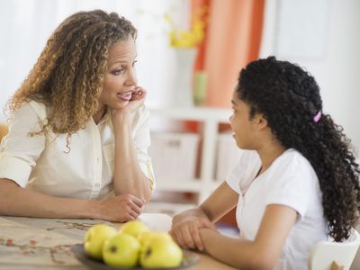 Mother talking with daughter