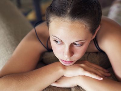 Teenage girl thinking