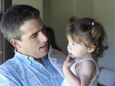 Close-up of a father face to face with his daughter