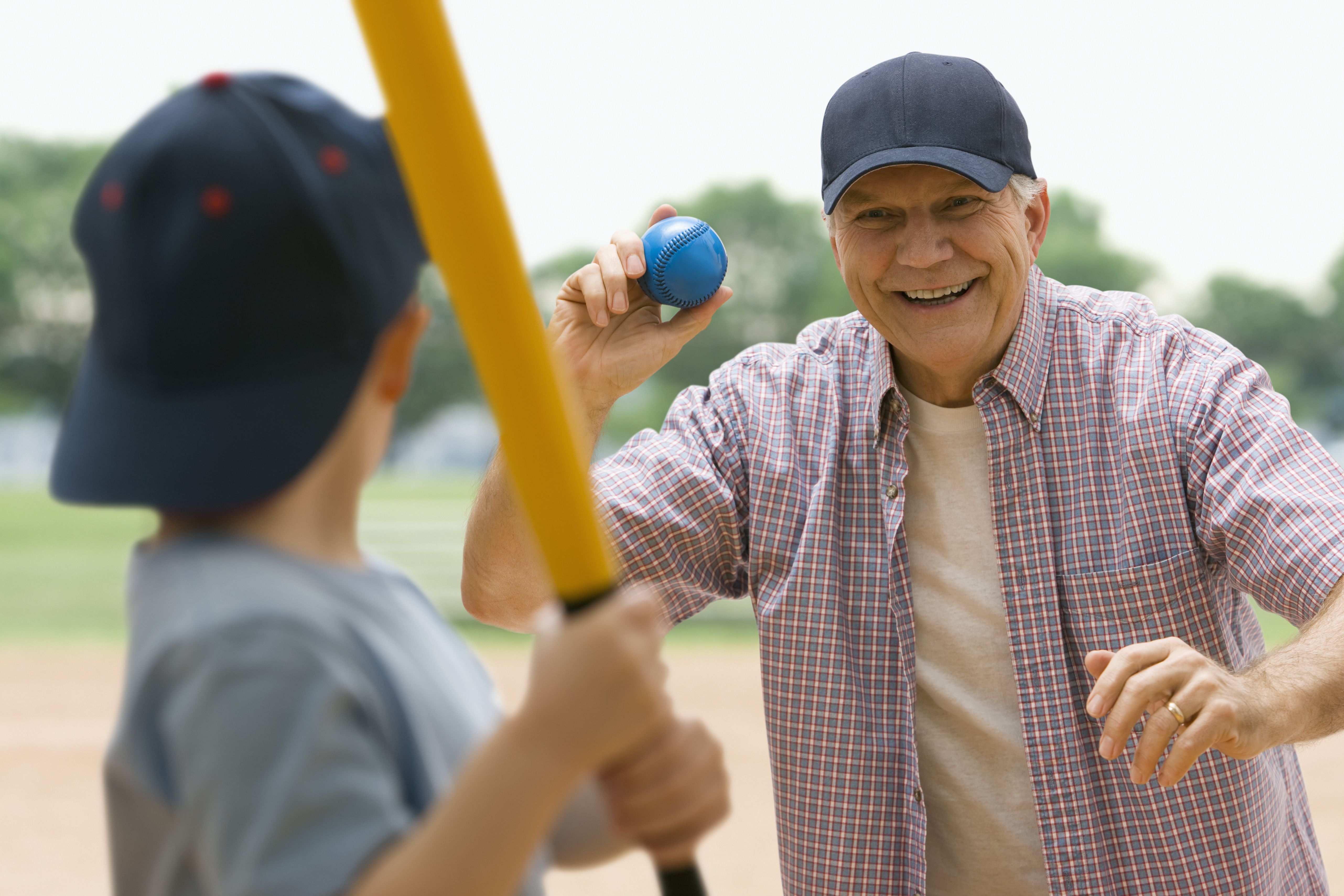 Grandfather and Grandson playing baseball