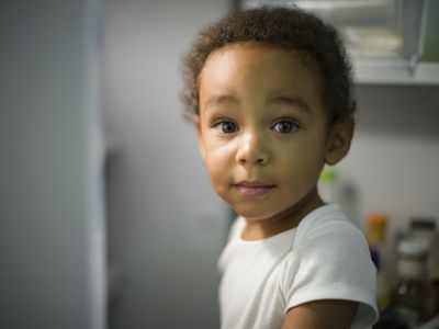 a little boy in a bathroom