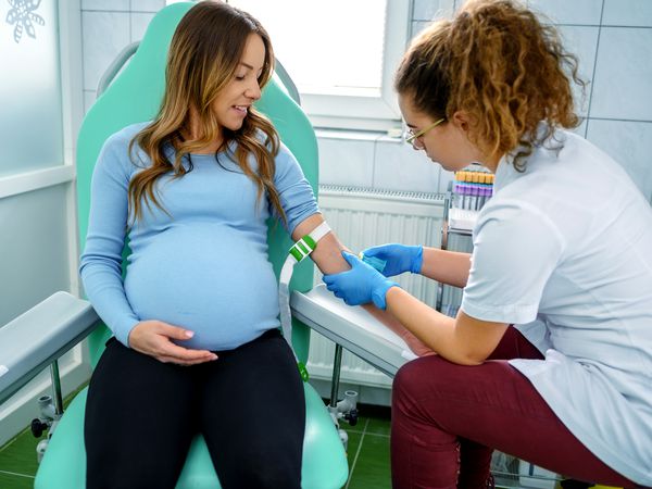 Pregnant woman getting a blood test