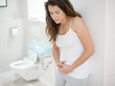 Woman with stomach cramps.