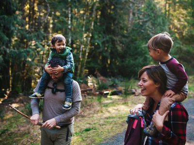 Family hiking in woods