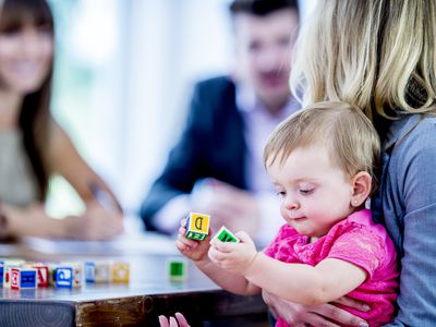 Parents interviewing babysitter