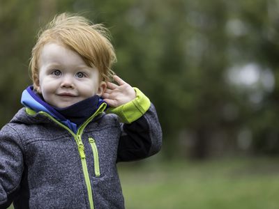 Toddler with red hair and green eyes