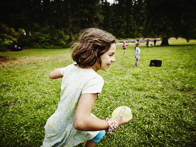 Play pirate's treasure - girl running on lawn