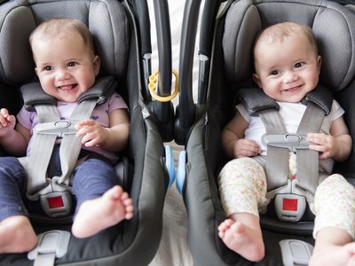 Twin babies in carseats