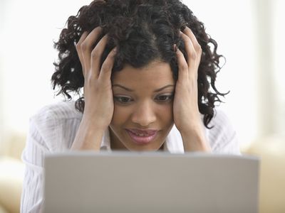 Woman looking up pregnancy information on her computer