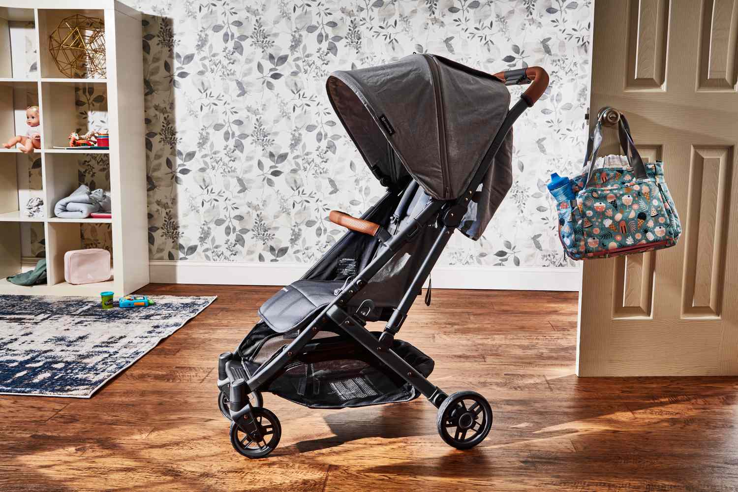 的Uppababy Minu V2 displayed unfolded in a room