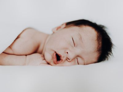 Sleeping baby with open mouth