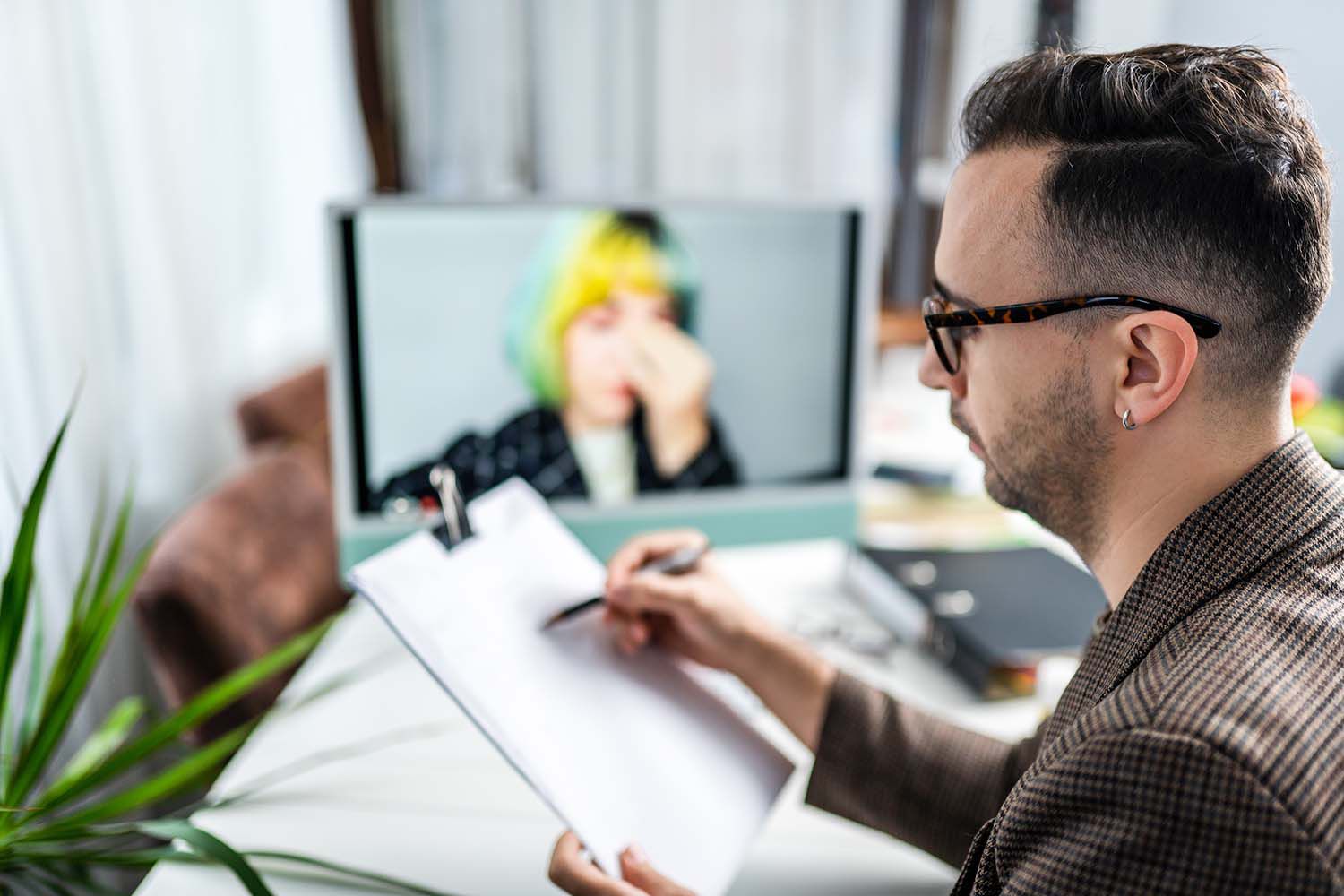 Male psychiatrist in online therapy session with his adhd patient