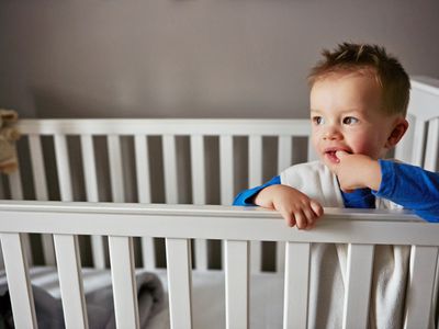 toddler awake in crib