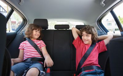 Children sat in a car