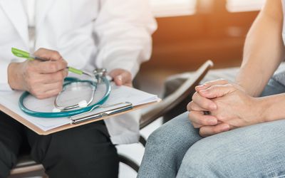woman with doctor
