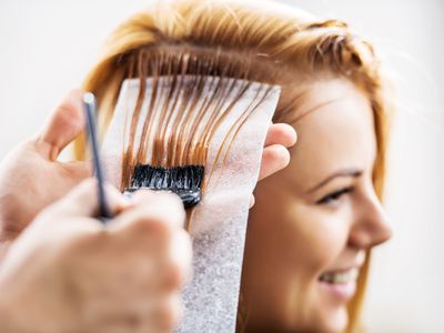 Woman dyeing hair