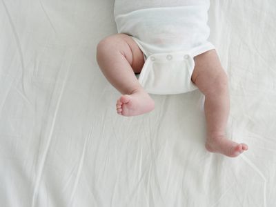 image of baby's legs in a onesie