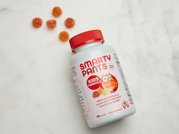SmartyPants Kids Formula Daily Gummy Multivitamin displayed on a marble surface