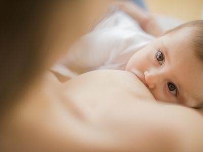 Mother breastfeeding baby.