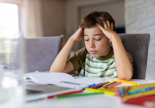 Boy having problems with homework