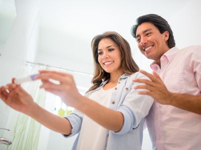 Couple taking a home pregnancy test