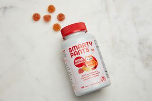 SmartyPants Kids Formula Daily Gummy Multivitamin displayed on a marble surface